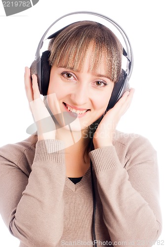 Image of Pretty woman listening music