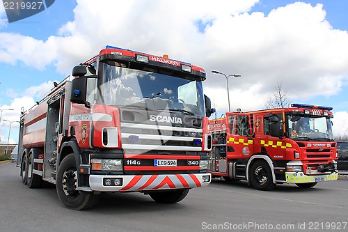 Image of Two Scania Fire Trucks on Display