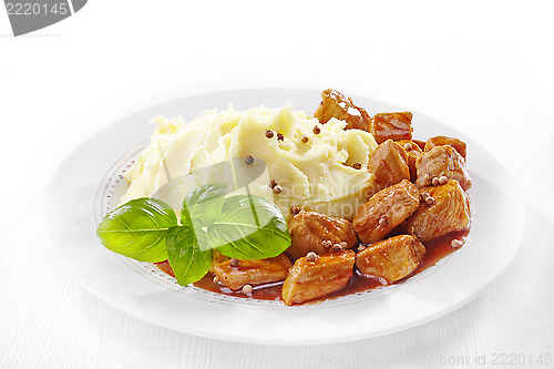 Image of mashed potatoes and meat stew