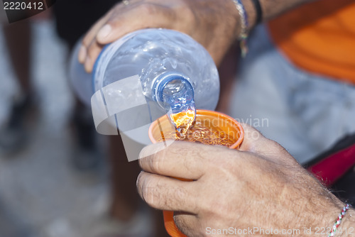 Image of water poured from the bottle