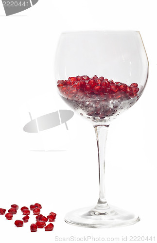 Image of fresh grains of pomegranate in wine glass