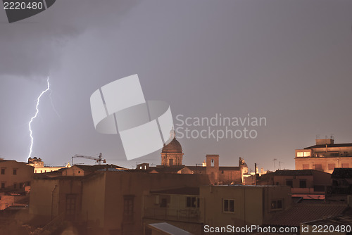 Image of lightning over urban houses in Palermo