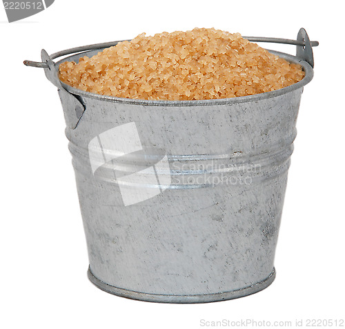 Image of Demerara sugar in a miniature metal bucket