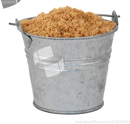 Image of Light brown soft / muscovado sugar in a miniature metal bucket