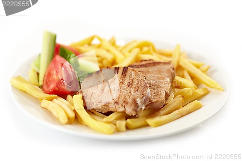 Image of grilled meat and french fries