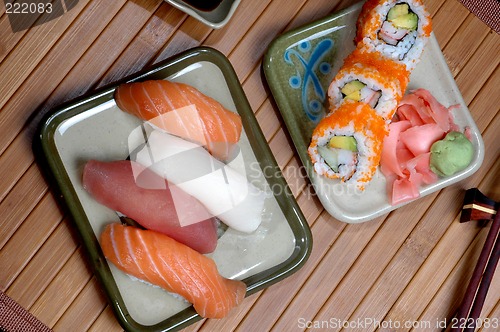 Image of Colorful sushi diner on a wood platter