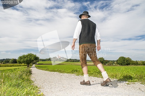 Image of Bavarian man going to monastery Andechs