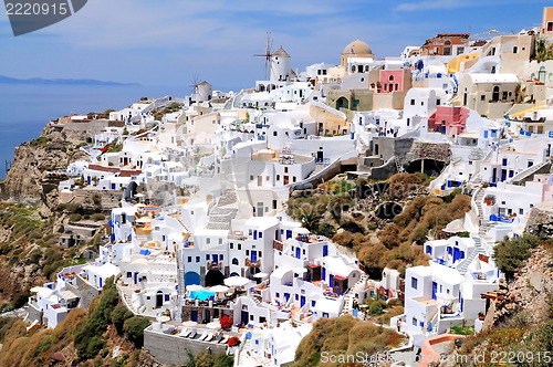 Image of Windmile and houses of Oia on Santorin island