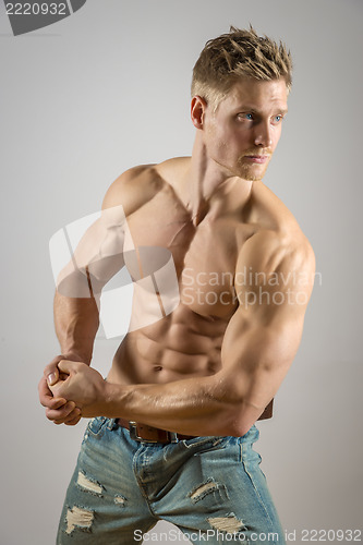 Image of Abdominal muscle of blond athletic man