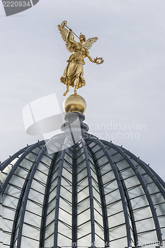 Image of Golden Statue with trumpet