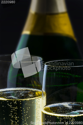 Image of Champagner bottle with two glasses