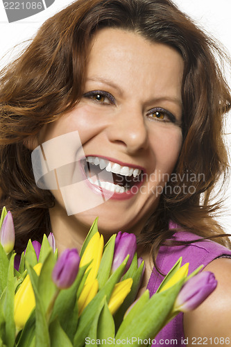 Image of Smiling woman with flowers