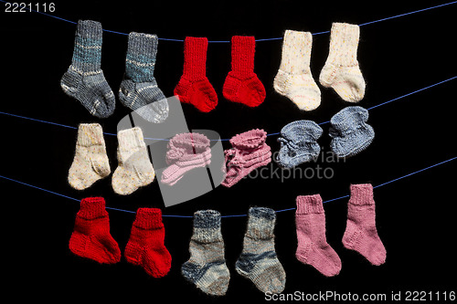 Image of Baby socks on black background