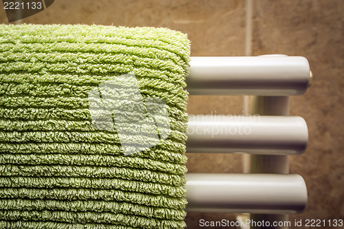 Image of Green towel on radiator