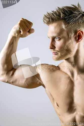 Image of Biceps muscle of young man