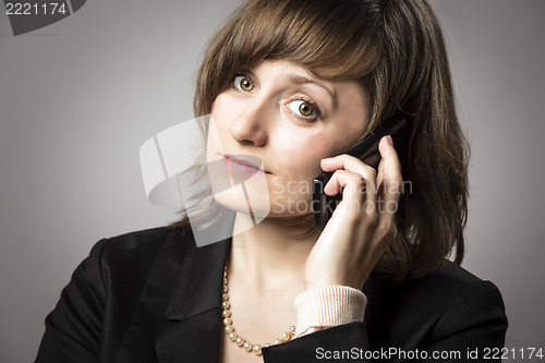 Image of Business woman on mobile phone