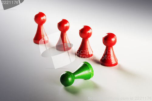 Image of red and green Ludo figures