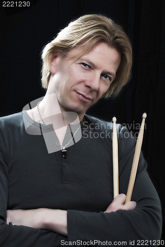 Image of Man with drum sticks