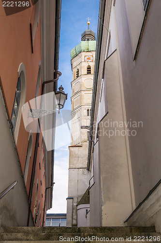 Image of Narrow alley with view to a steeple