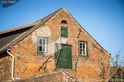 Image of Front view red brick house