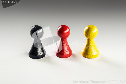 Image of Black red yellow Ludo figure