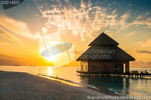 Image of Sunset on Maldives island, water villas resort