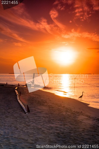 Image of Sunset on Maldives island, water villas resort