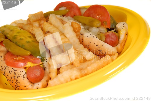Image of Closeup of Chicago style hot dogs with french fries