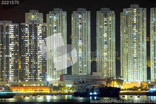 Image of apartment building at night