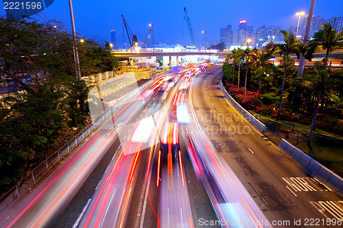 Image of Futuristic urban city night traffic 