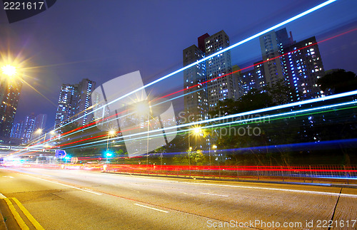 Image of Futuristic urban city night traffic