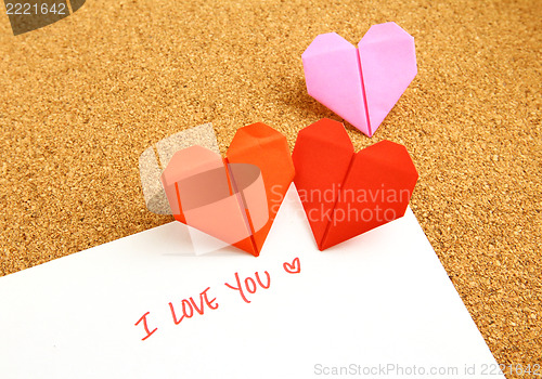 Image of Origami paper hearts with message 