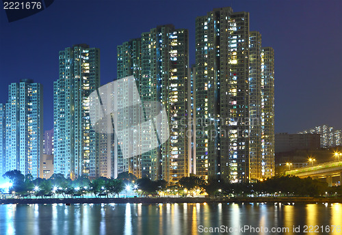 Image of apartment building at night