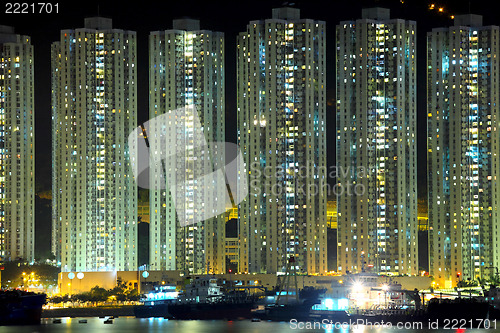 Image of apartment building at night