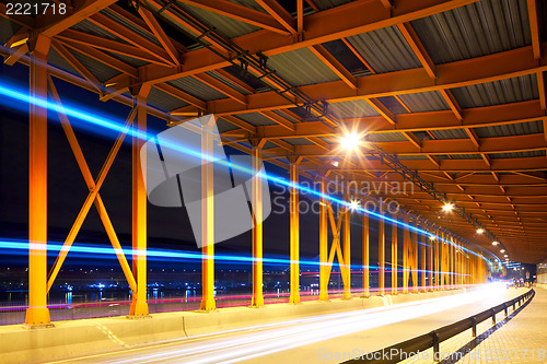 Image of night traffic in tunnel