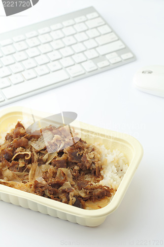 Image of fast food lunch on working desk 