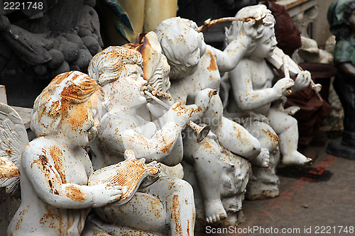 Image of Angels at the flea market. Paris