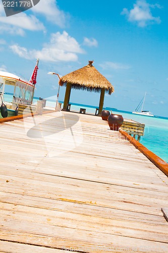 Image of Wooden wharf with pavilion for ships at Maldives