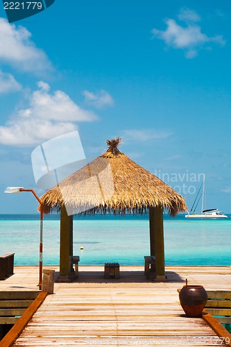 Image of Wooden wharf with pavilion for ships at Maldives