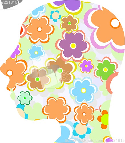 Image of silhouette of a woman head filled with cute flowers