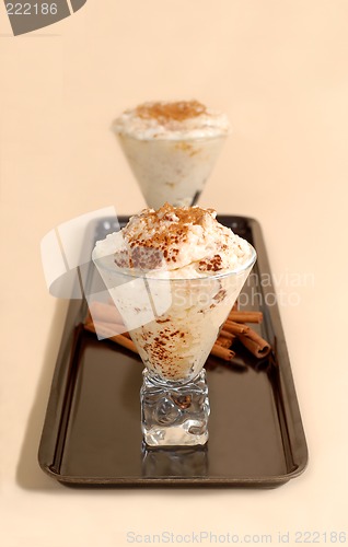 Image of Two glasses of rice pudding with cinnamon