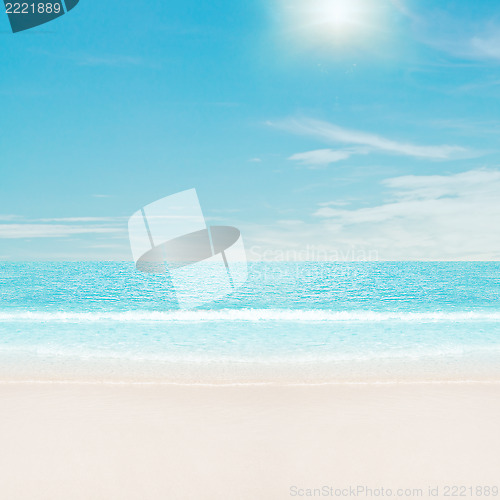 Image of Sun over tropical beach