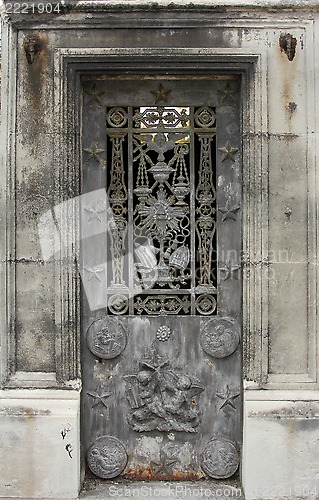 Image of Beautiful ornate tomb door in the Pere Lachaise cemetery, Paris