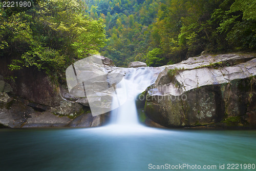 Image of Deep forest waterfall in Wuyuan, China.