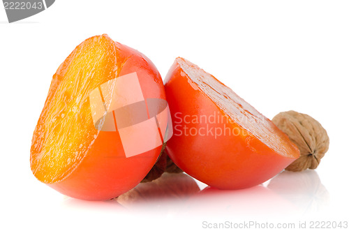 Image of Ripe persimmons and nuts