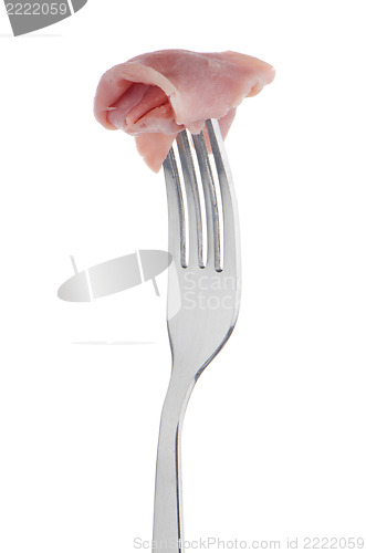 Image of Slice of ham skewered on a fork 