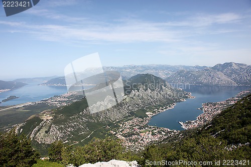 Image of Bay of Kotor with high mountains plunge into adriatic sea and Historic town of Kotor, Montenegro