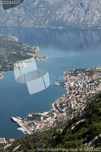 Image of Bay of Kotor with high mountains plunge into adriatic sea and Historic town of Kotor, Montenegro