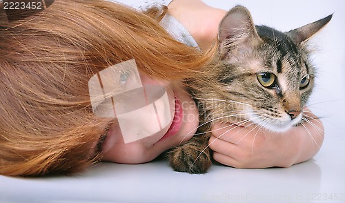 Image of little girl communicating with her pet