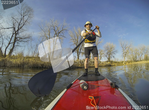 Image of paddling stand up board